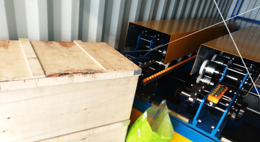 width adjustable metal roll forming machine loaded in a 20ft container